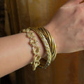 Gold Woven Bangle